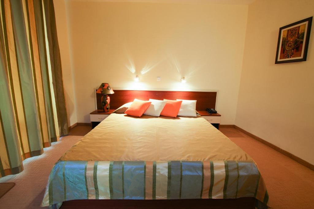 Postel nebo postele na pokoji v ubytování Hotel Veris