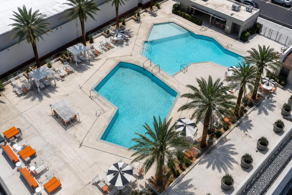 an overhead view of a pool with palm trees at Collection O Las Vegas in Las Vegas
