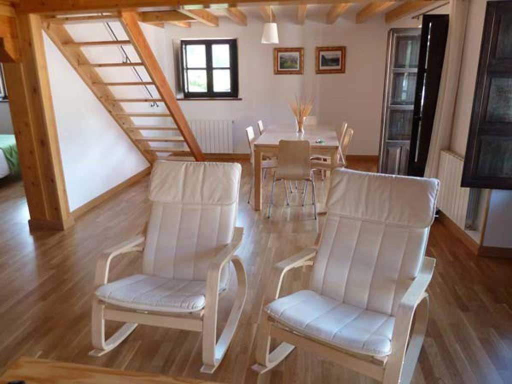 Posedenie v ubytovaní Apartamentos Casa de la Abuela