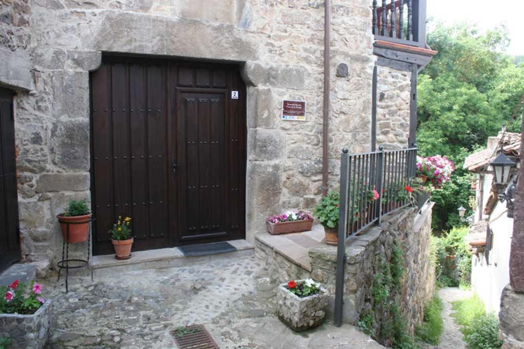 Vonkajšia záhrada v ubytovaní Apartamentos Casa de la Abuela