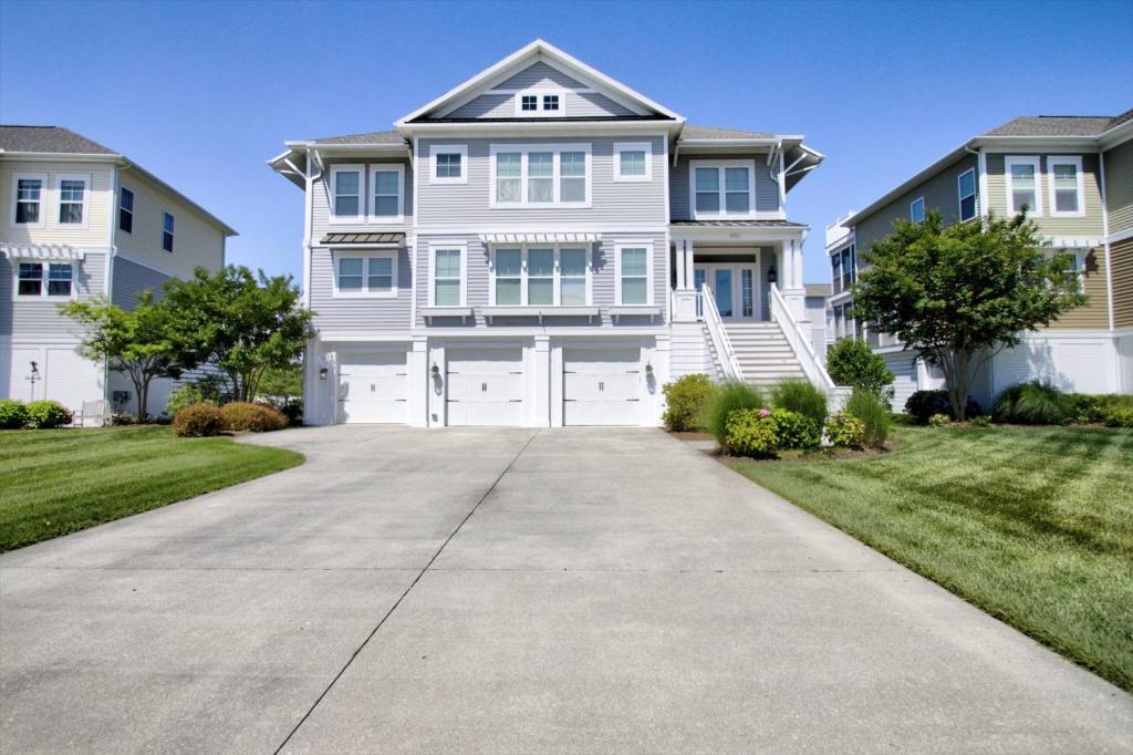 a large white house with a driveway at 36967 S. Silver Sands Dr, Bethany Beach in Bethany Beach