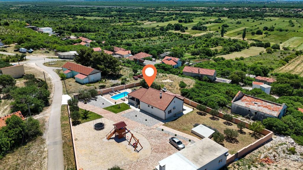an aerial view of a house with a pool at Villa Zrilic with Private Pool in Benkovac