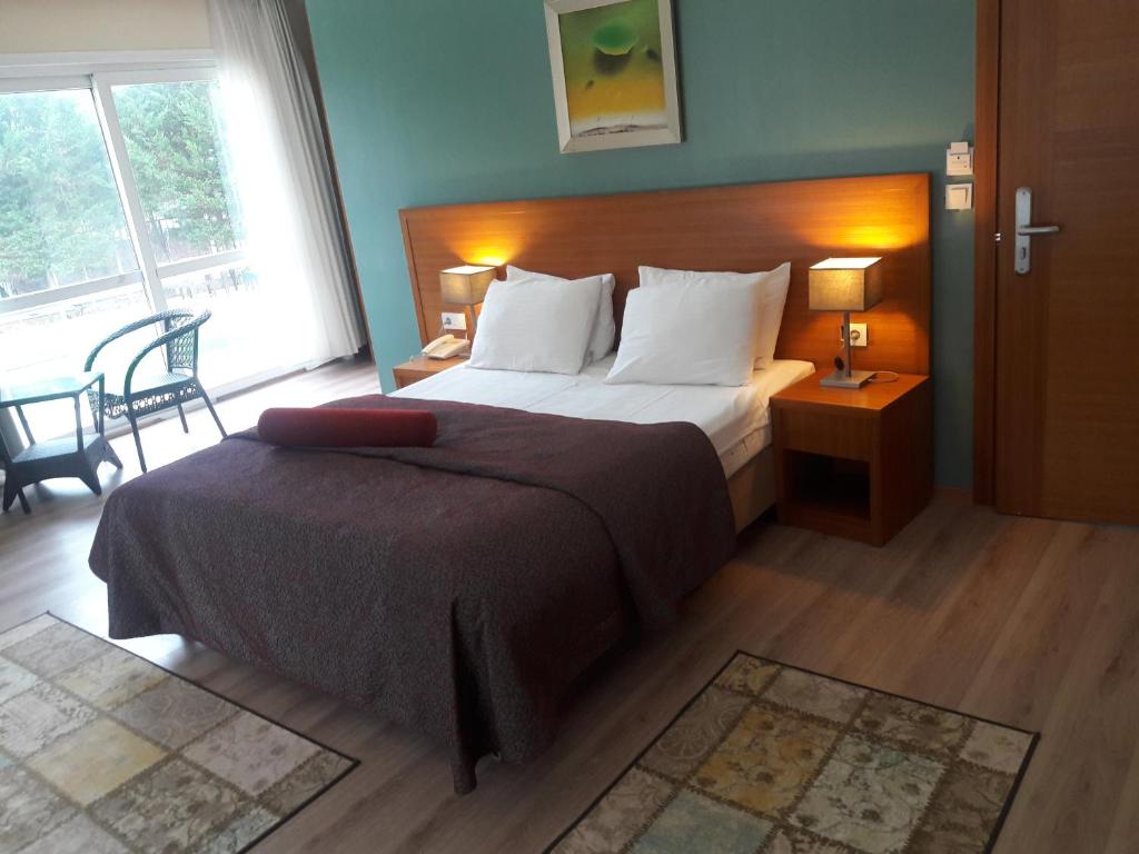 Postel nebo postele na pokoji v ubytování Island Hotel