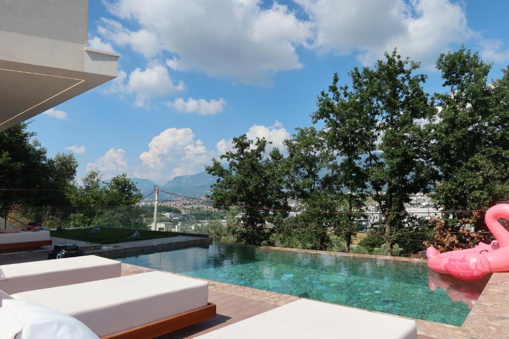 a swimming pool with a view of a city at Panorama Hill Villa Tirana - Private Pool & Views in Tirana