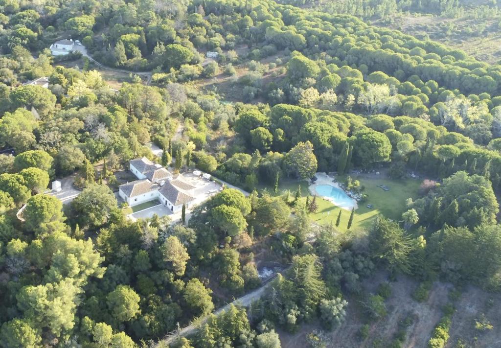 an aerial view of a house in a forest at Quinta da Arrábida in Sesimbra