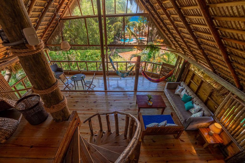 an overhead view of a living room in a tree house at Mar Villa Eco Lodge Surf & Kite Perla Marina by Encuentro Beach in Sosúa