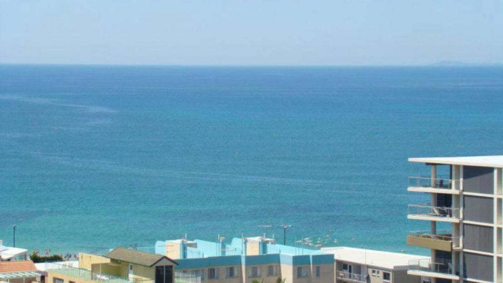 a view of the ocean from a building at Unit 33 Outlook Caloundra - Stunning Views! in Caloundra