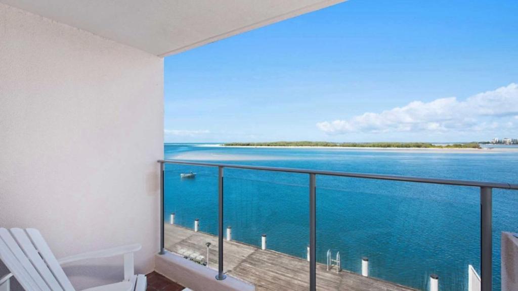 a balcony with a view of the ocean at Pumicestone Chase Unit 8 in Caloundra
