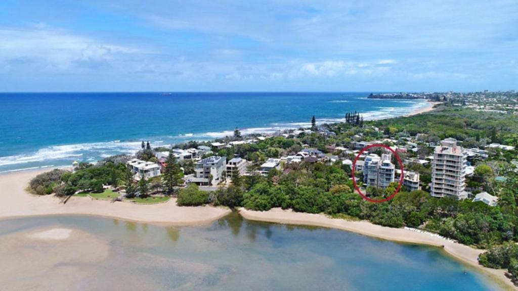 an aerial view of a beach with a roller coaster at Outlook Unit 7 in Kawana Waters