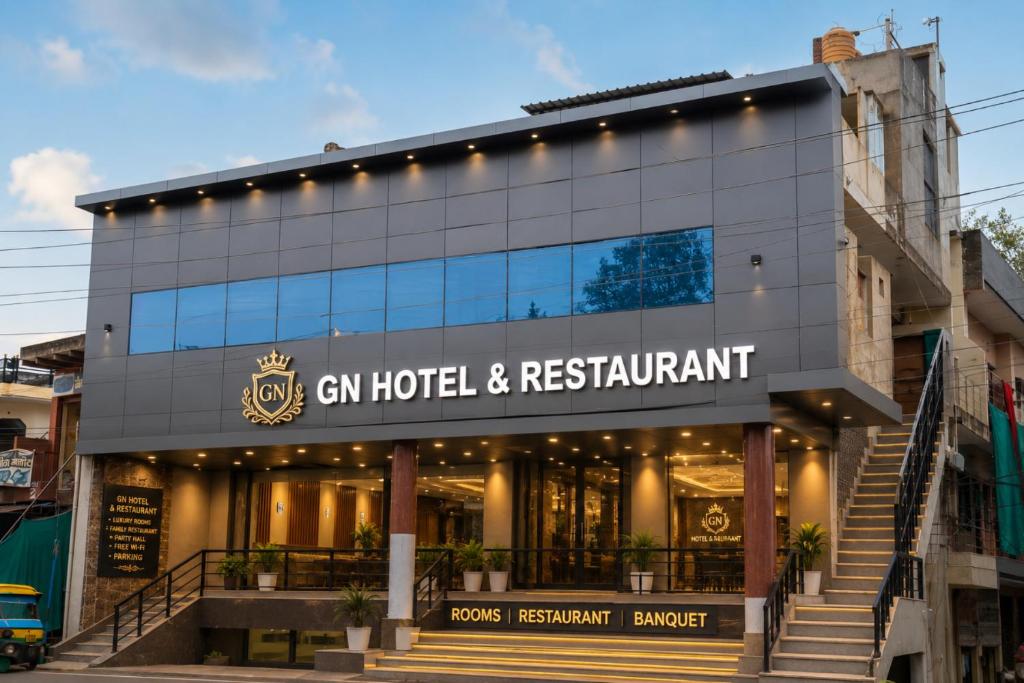 a building with a sign that reads chen hotel restaurant at G N Hotel & Restaurant Bodla in Agra