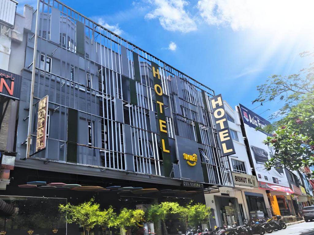a building with the words hotel on it at Smile Hotel Wangsa Maju in Kuala Lumpur