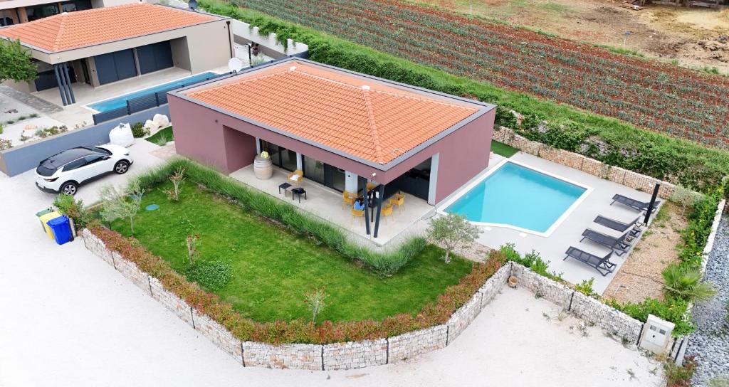 an overhead view of a house with a swimming pool at Vila Dora with Private Pool in Radetići