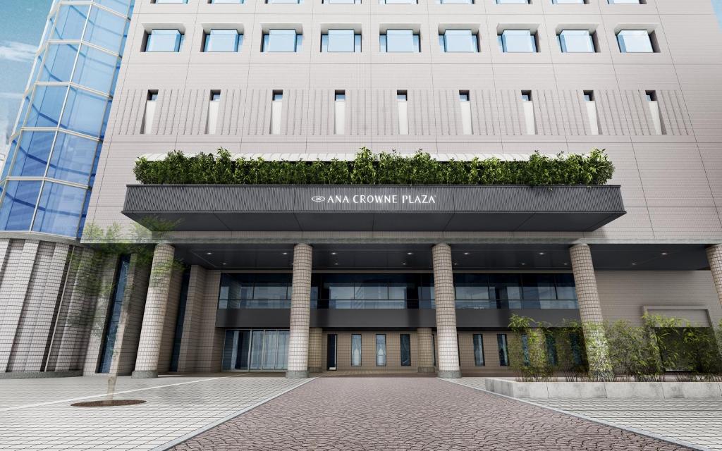 a building with a planter on the top of it at ANA Crowne Plaza Chiryu by IHG in Chiryu