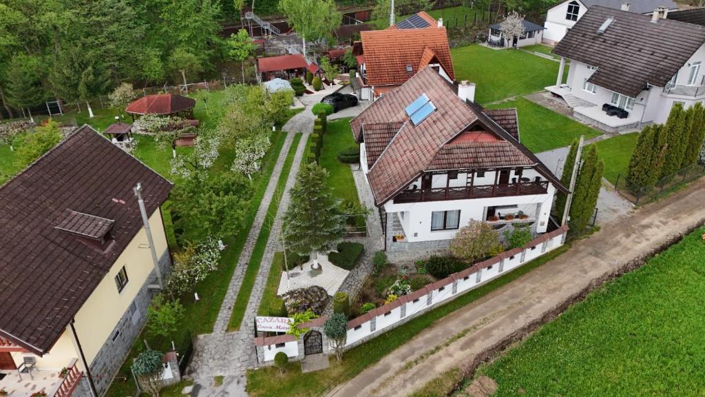 an aerial view of a large house with a yard at Pension Casa Maria in Sovata