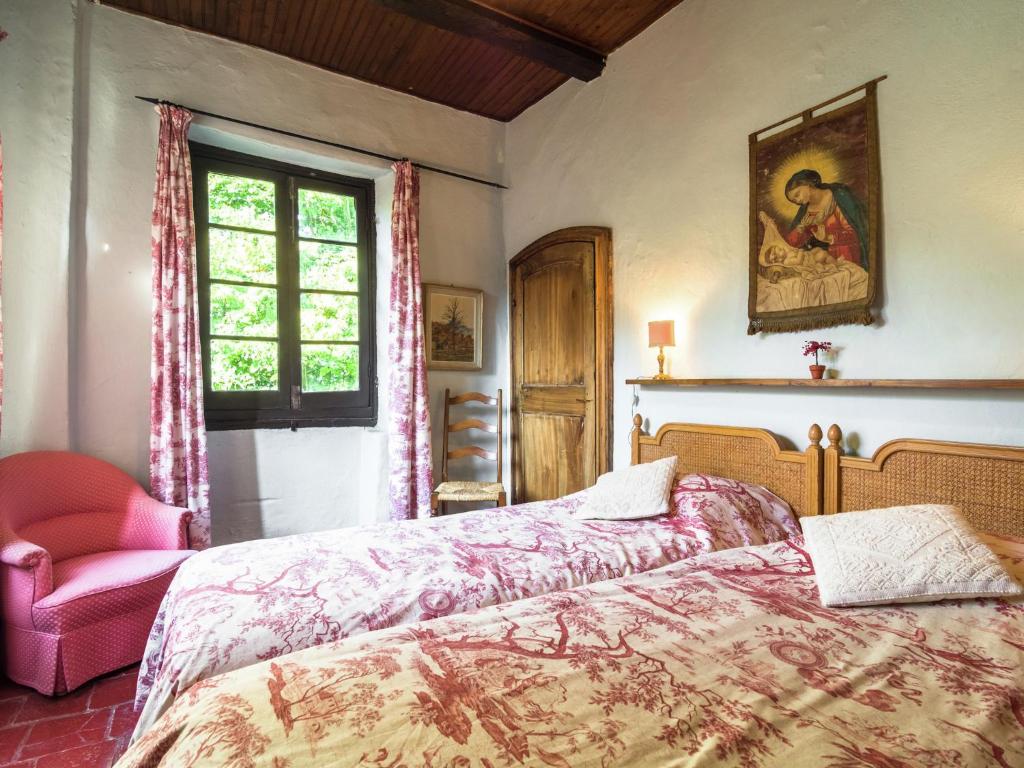 Postel nebo postele na pokoji v ubytování Apartment in Cut Monferrato with garden