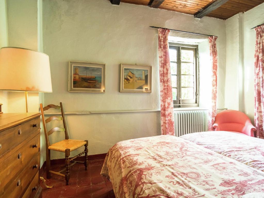 Postel nebo postele na pokoji v ubytování Apartment in Cut Monferrato with garden