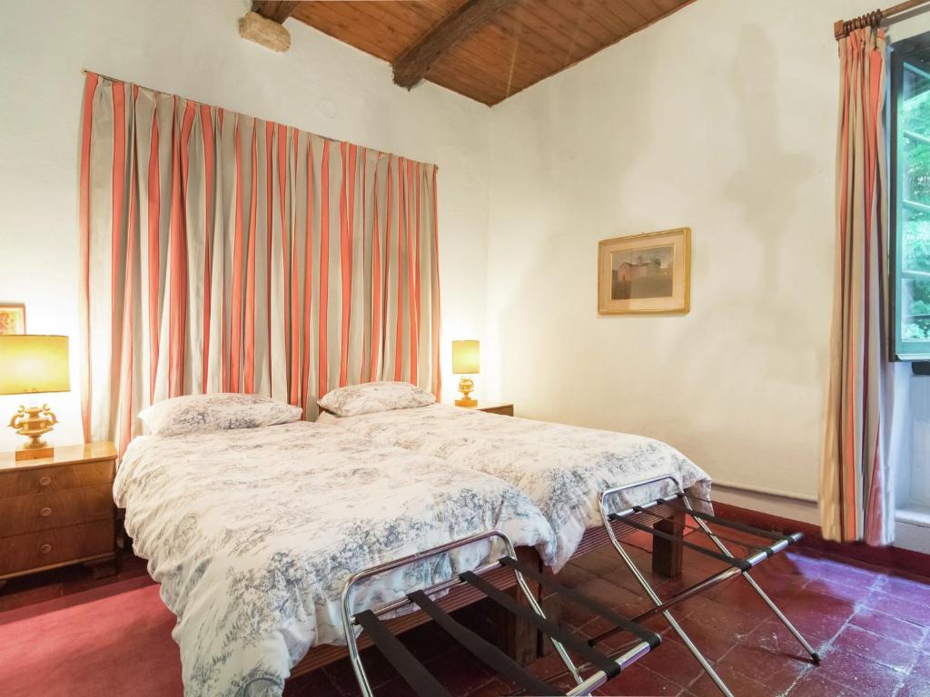 Postel nebo postele na pokoji v ubytování Apartment in Cut Monferrato with garden