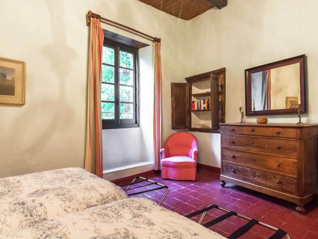 Postel nebo postele na pokoji v ubytování Apartment in Cut Monferrato with garden