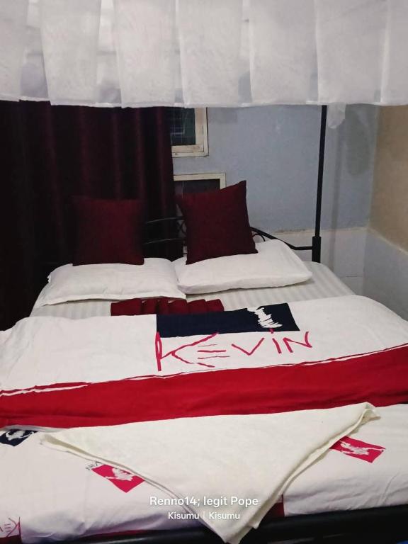 Llit o llits en una habitació de Dignitaries hotel