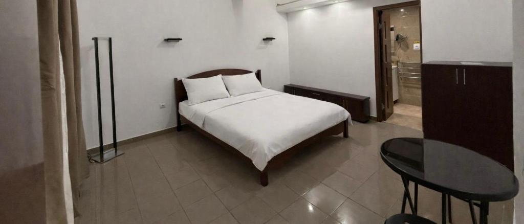 Llit o llits en una habitació de SMK Techir