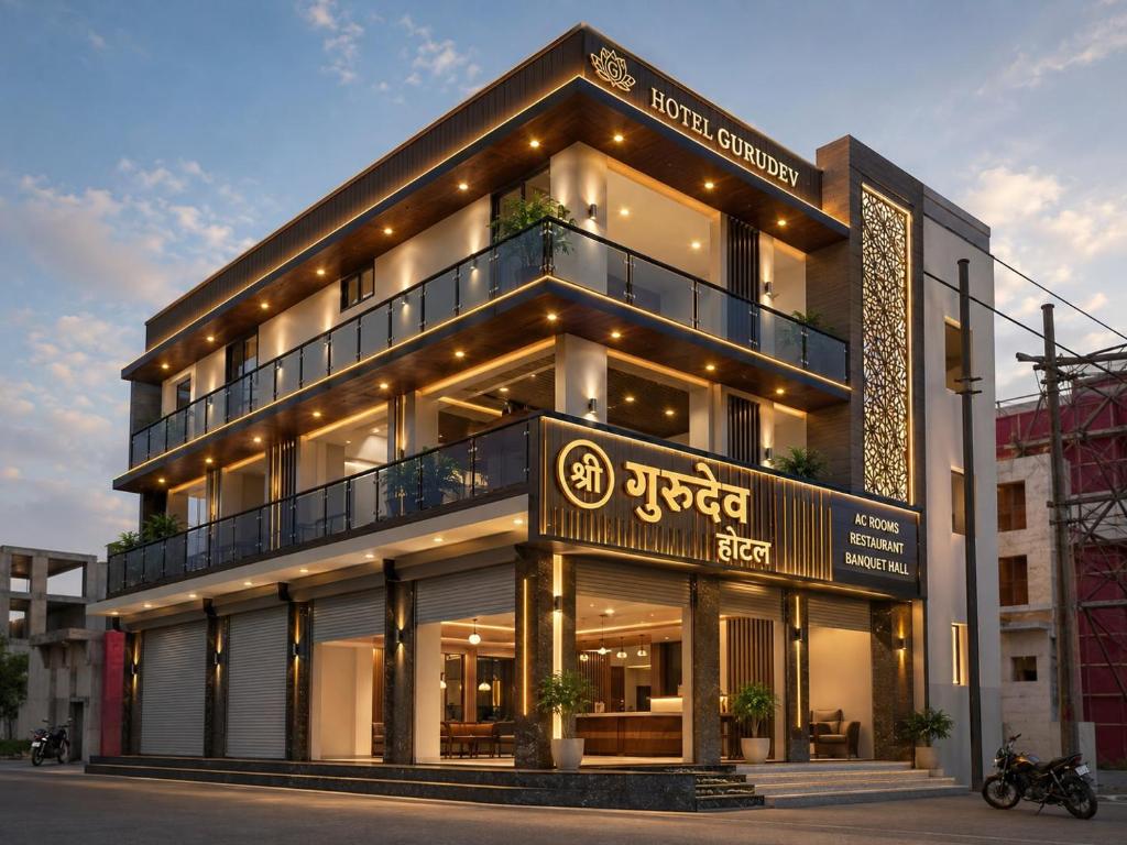 a building with a sign on the side of it at Hotel avigat kabir sanwer in Indore