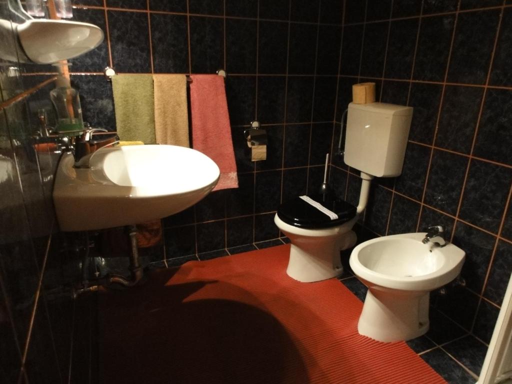 Koupelna v ubytování Rooms Marko Polo