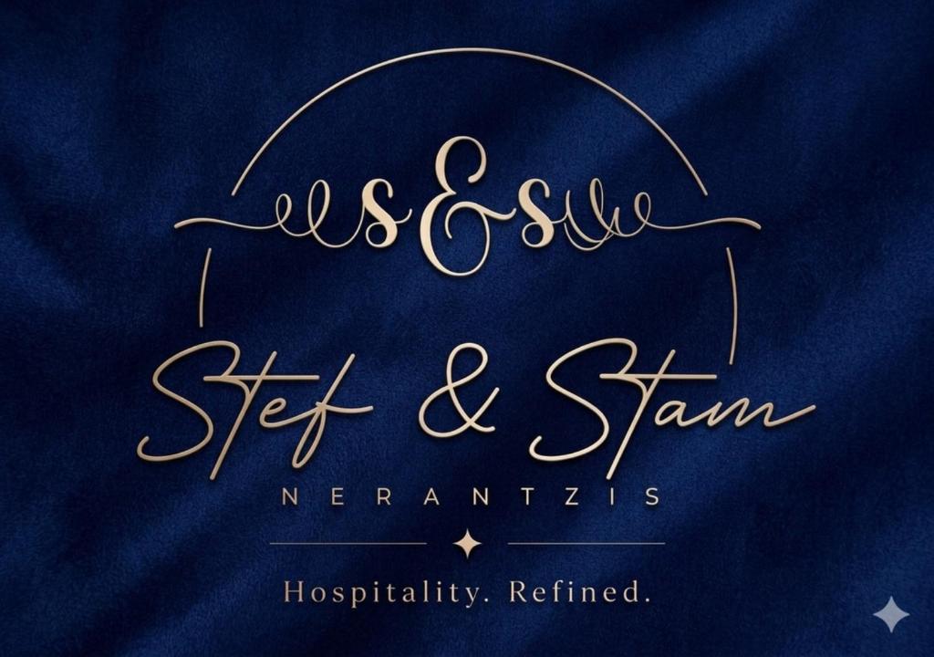 a sign that reads ussie set and stam merimani at Stef & Stam Nerantzis in Himare