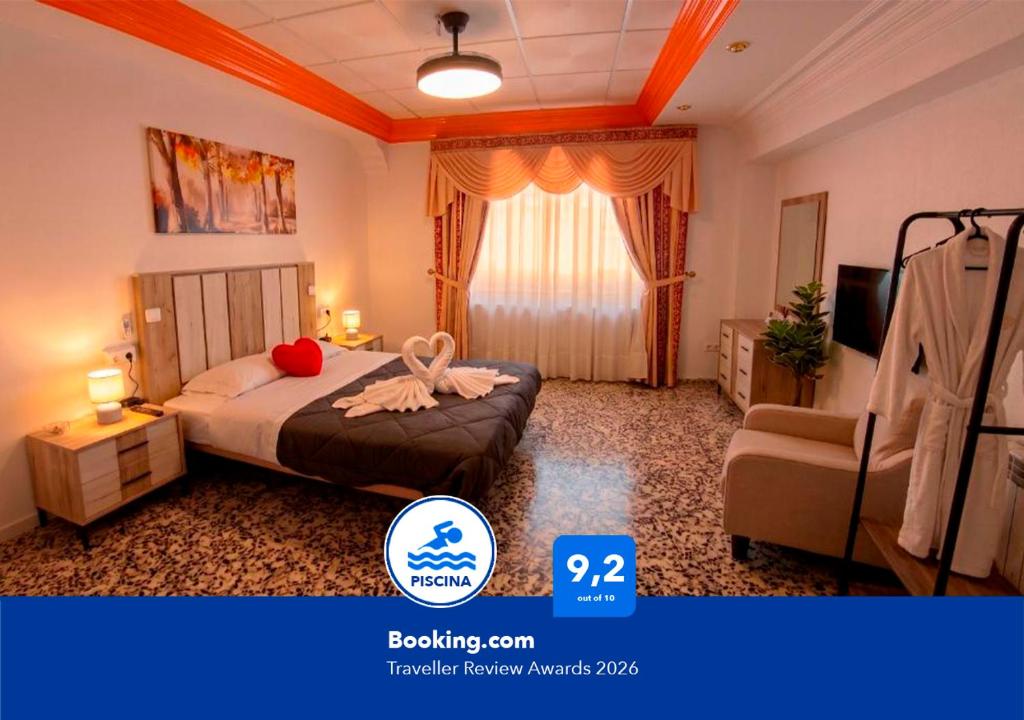 a hotel room with a bed and a chair at Ruralux Sierra Castril in Huéscar