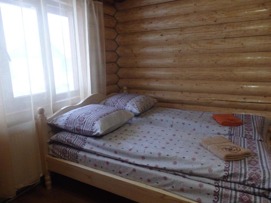 Postel nebo postele na pokoji v ubytování Kreitser