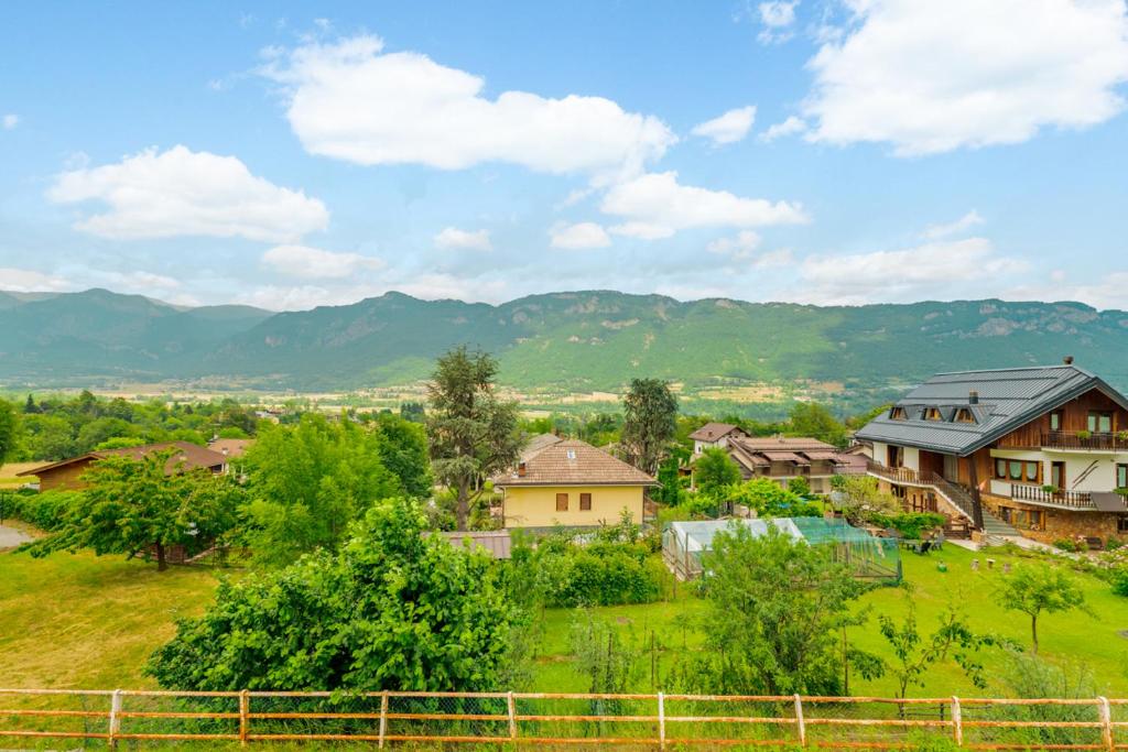 a view of a village with mountains in the background at All'antico Peso in Demonte