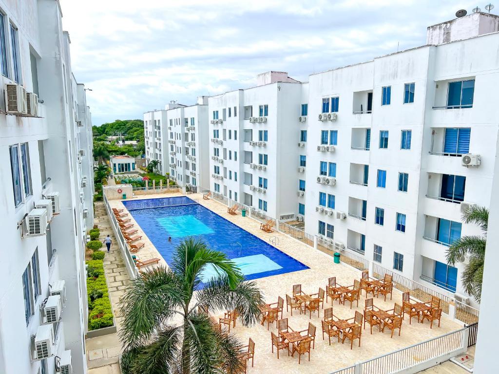 an overhead view of a swimming pool in a building at Mirador, Coveñas 302 in Coveñas