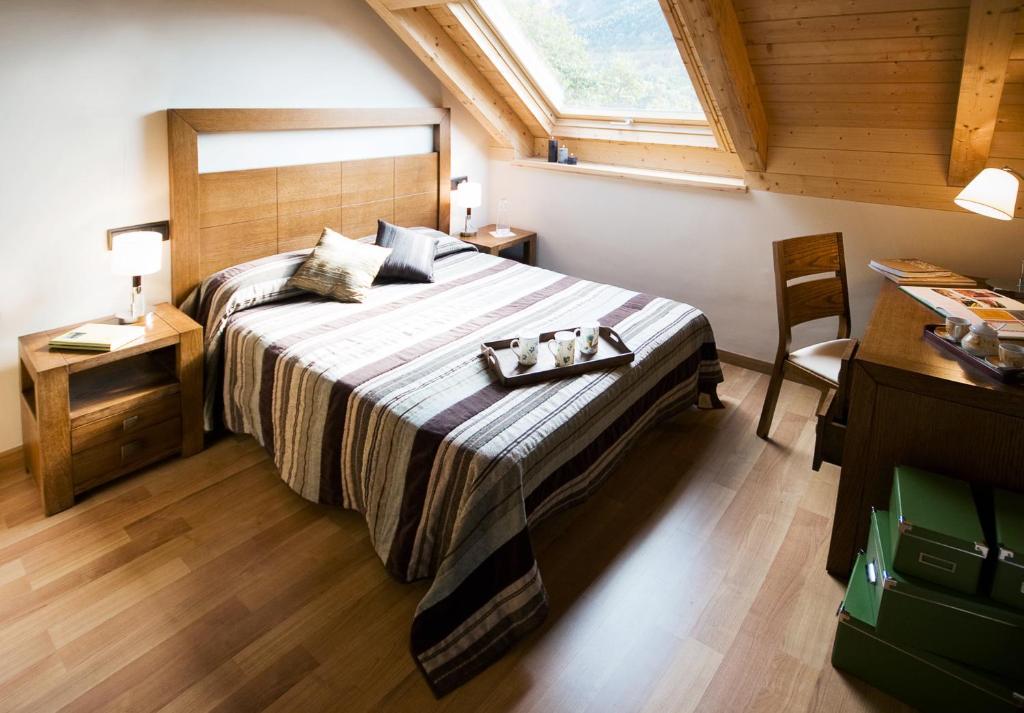 Voodi või voodid majutusasutuse Apartaments Petit Saüc toas