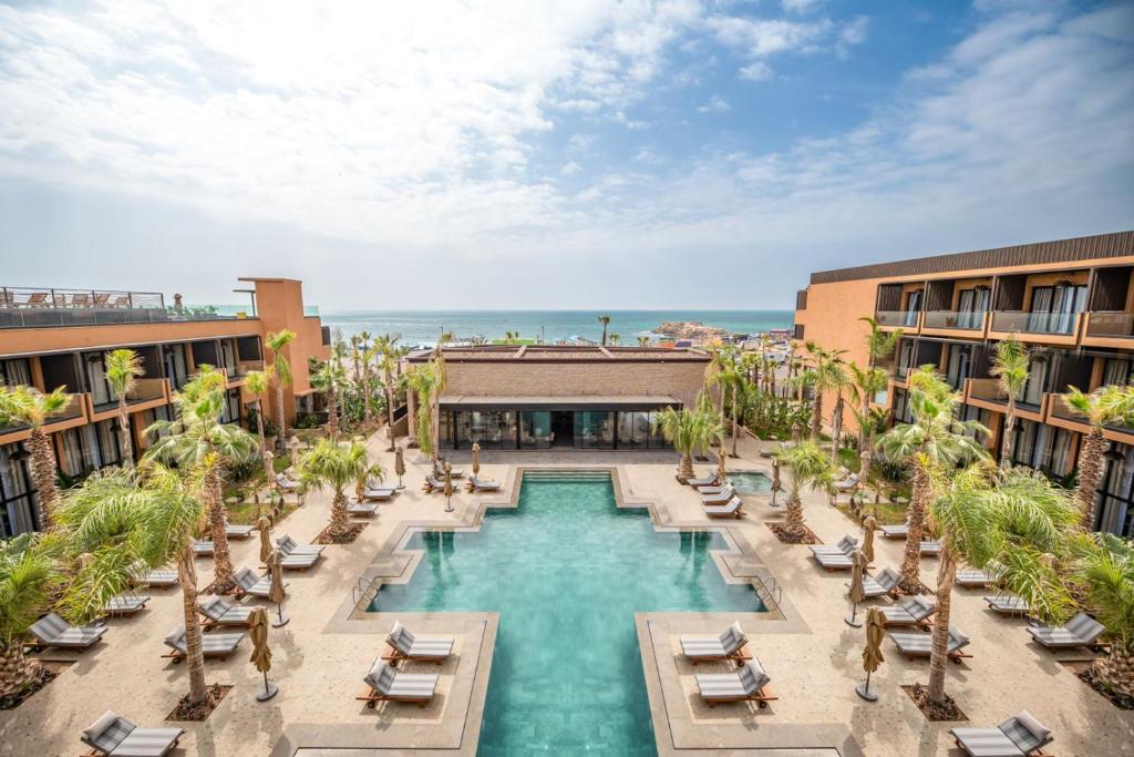 an aerial view of the pool at the resort at Taghazout Palm Hotel in Taghazout