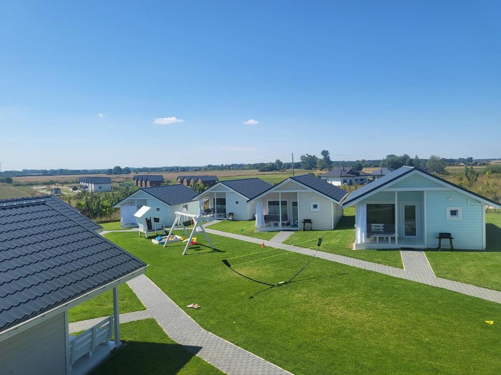 an overhead view of a house yard with a playground at Zante Sarbinowo in Sarbinowo