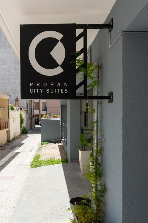 a sign on the side of a building at PROPAN CITY SUITES in Volos
