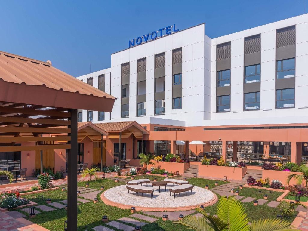a rendering of the front of the morgan hotel at NOVOTEL KOLWEZI in Kolwezi