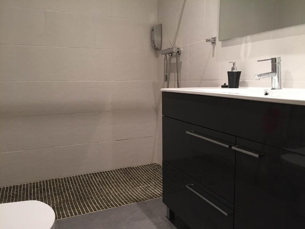 Koupelna v ubytování Apartahotel Baldiri