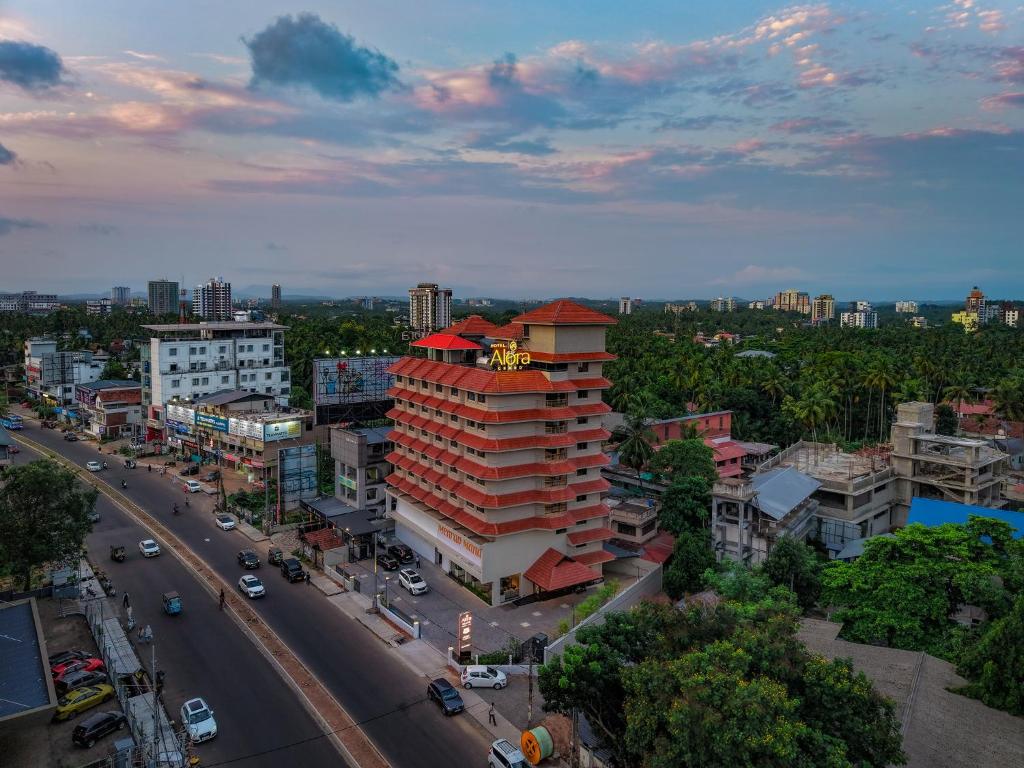 an overhead view of a city with a building at Alora Grand Hotel Calicut in Kozhikode