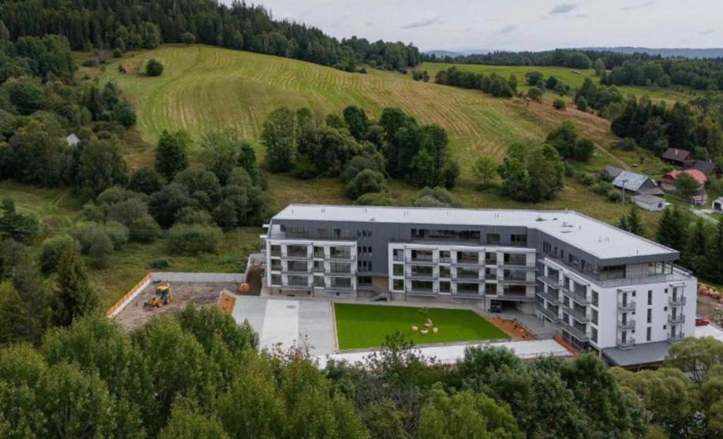 an aerial view of a building in a field at Apartmant Beatrice in Veselé