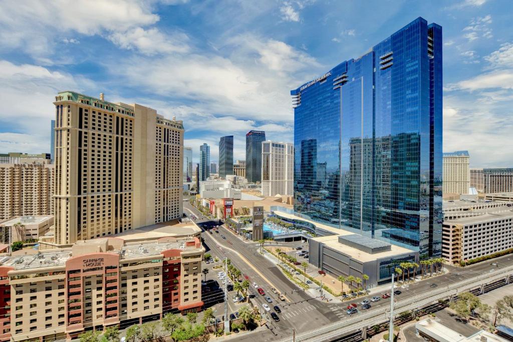 No Resort Fee - Balcony Strip Views, Pools & Parking photo