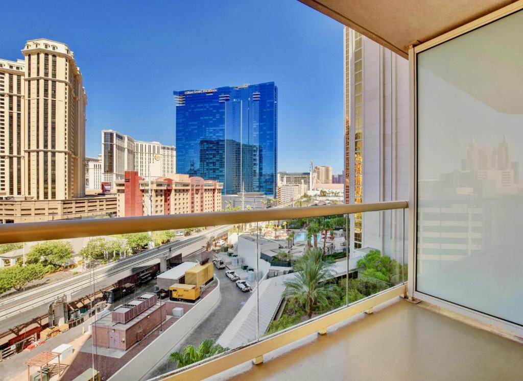 No Resort Fee - Balcony Strip Views, Pools & Parking photo