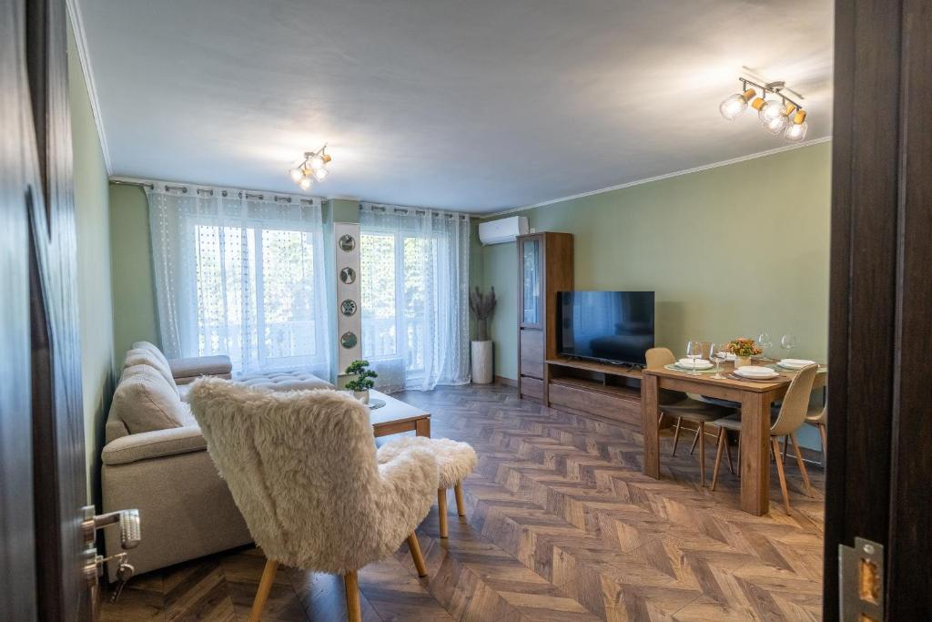 a living room with a couch and a table at V&G Apartments in Kyustendil