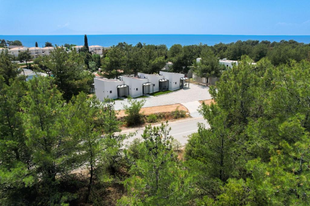 an aerial view of a row of white buildings at Pine Suites in Potos