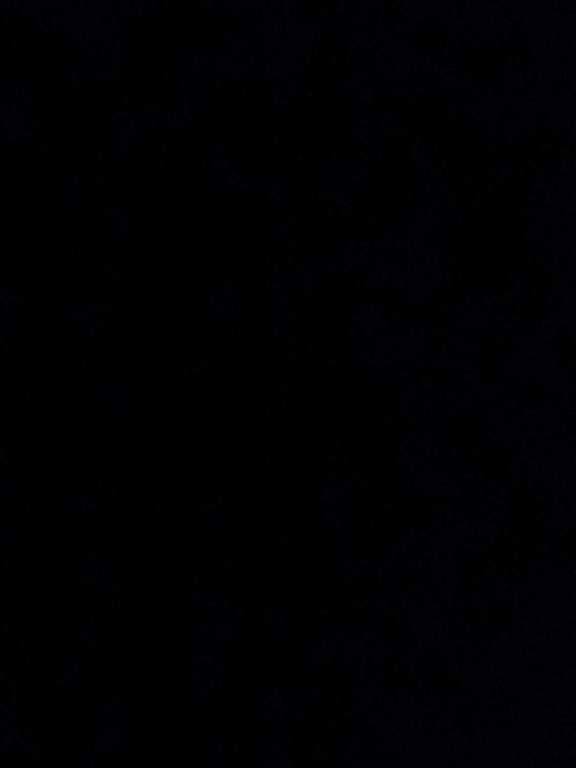 a dark room with a person standing in the darkness at Proprietate inchisa!!! Nu rezervati in Alba Iulia