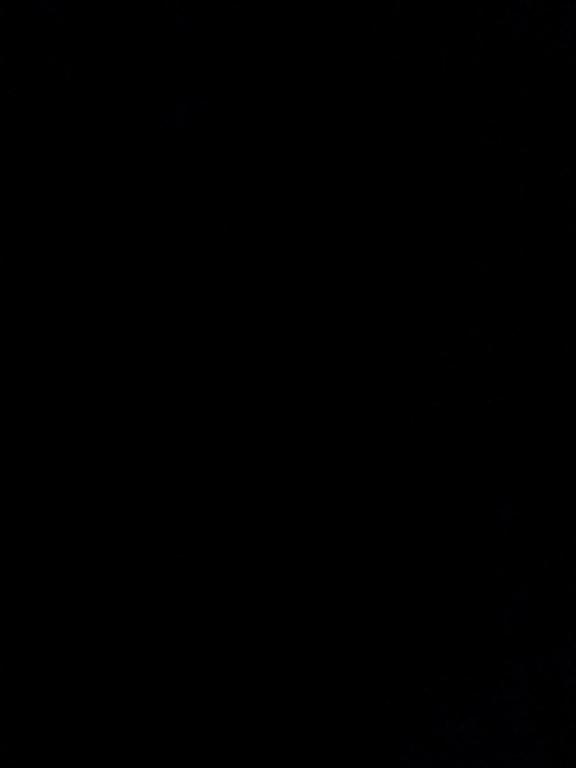 a dark room with a black background with a candle at Proprietate inchisa!!!!Nu rezervati in Alba Iulia