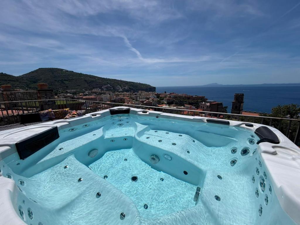 a swimming pool on the roof of a building at Corte Degli Ulivi Resort in Vico Equense