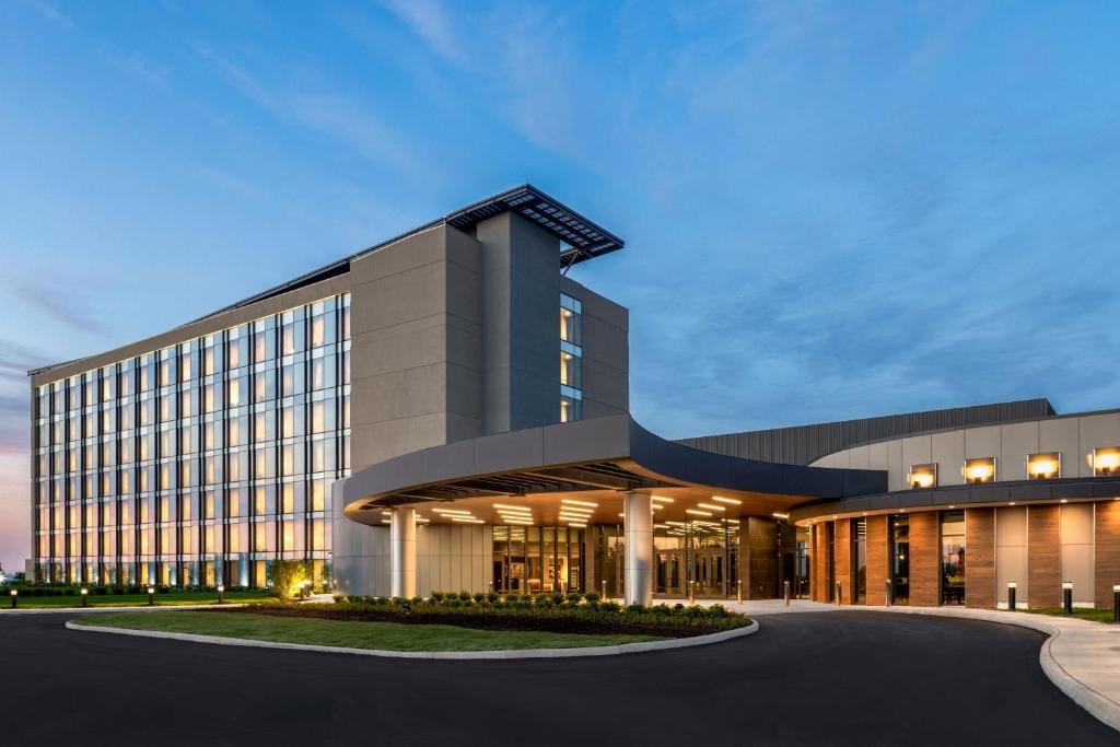 a rendering of a building at dusk at Hollywood Casino & Hotel Columbus in Columbus