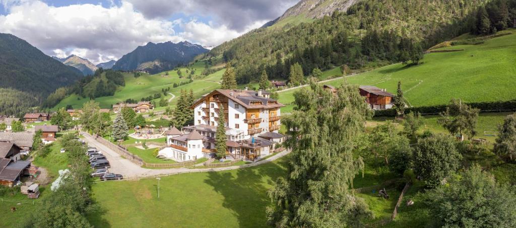 an aerial view of a resort in the mountains at Replers Hotel garni & Appartements in Prägraten