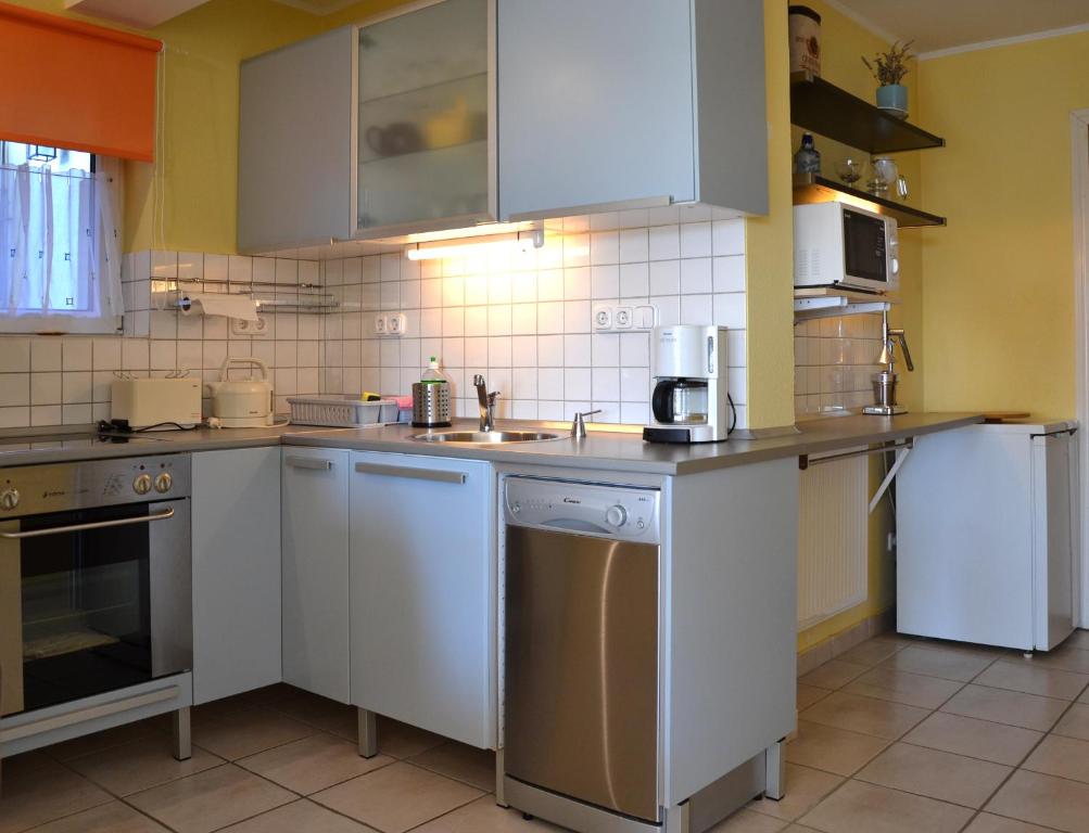 Kuchyň nebo kuchyňský kout v ubytování Anna Apartment