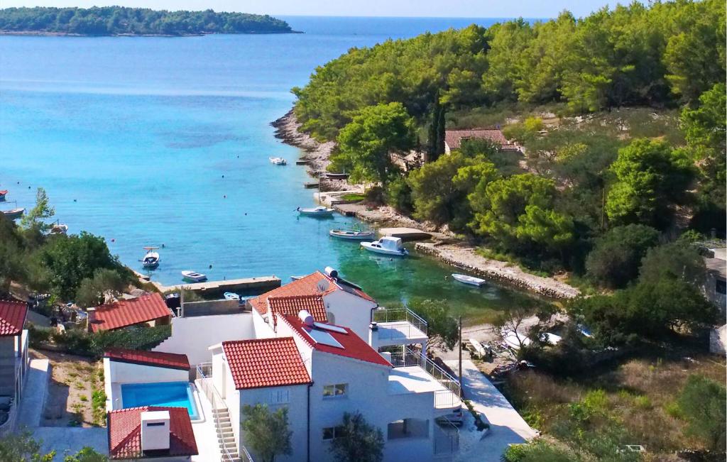 an aerial view of a village with boats in the water at Villa Beachfront Korcula in Vela Luka